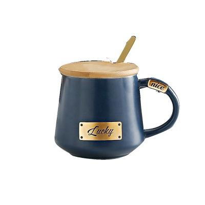 China Viable Creative English Letter Handle Ceramic Coffee Mug With Wooden Lid for sale