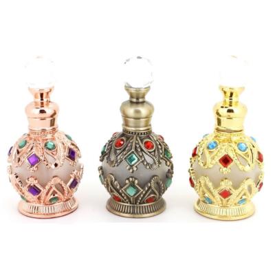 China Personal Care Vintage Metal Essential Oil Perfume Empty Refillable Arabic Dropper Bottle for sale