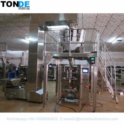 中国 Full Automatic Vertical Pillow Bag Grain Granule Filling And Rice Packing Machine 販売のため