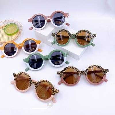 China Retro fashion sunglasses round comfortable baby shades sunglasses aged 1 to 8 children two color summer travel kids glasses for sale