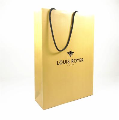 China High Quality Eco-friendly Sustainable Emboss Boutique Paper Shopping Bag Gift Bag for sale