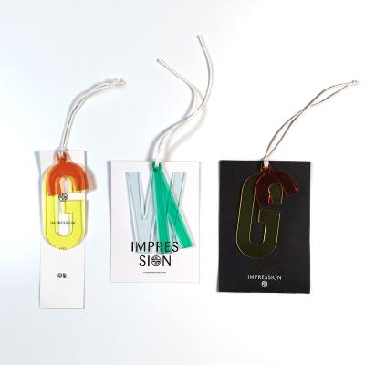 China Showcase Modern Design Printing Embossing Apparel Logo Tags Custom Pantone Color Tag Label Maker for sale