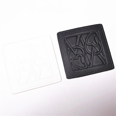 China Top Quality Washable Sustainable Custom Clothing Leather Label Labels Embossed Leather Labels for sale