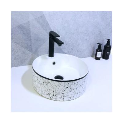 China Modern Simple Design Round Shape Black Line With Pattern Above Countertop Basin For Hotel for sale