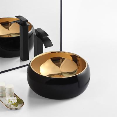 China Modern Small Size Shiny Black Bowl Basin Sink Bathroom WC Counter Top Basin OEM ODM Gold Basin for sale