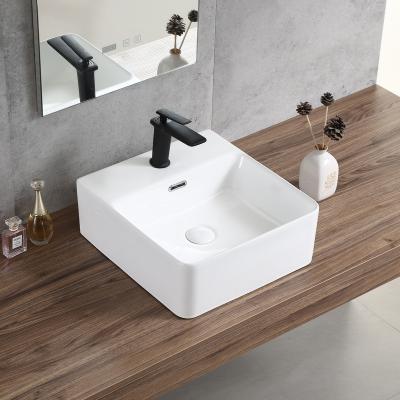 China Modern Hot Sale Mini Art Hand Wash Basin Bathroom Ceramic Table Top Rectangular Small Sink for sale