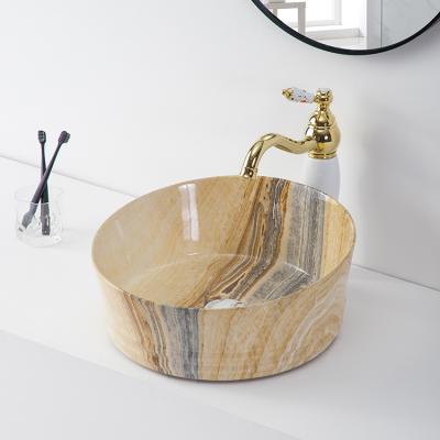 China Modern Design Bathroom Wash Hand Sink Marble Freestanding Ceramic Pattern Art Basin for sale