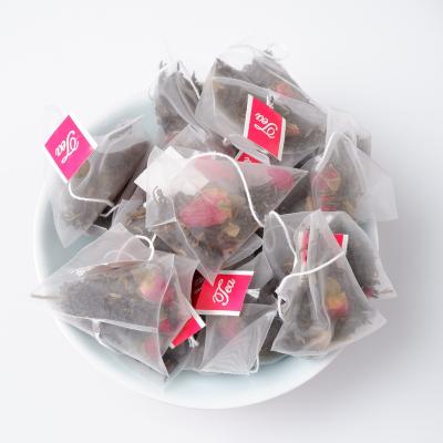 China Natural / High Quality Rose Flower Black Pu Er Tea Flavored Tea In Pyramid Tea Bag for sale