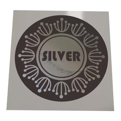 China New Waterproof Logo Label Sticker Roll Gloss Silver Bestselling Waterproof Custom Sticker for sale