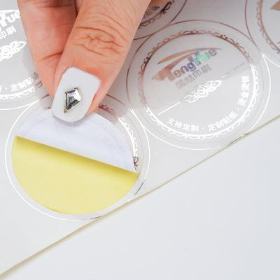 China Custom Transparent Seal Sticker LOGO Sliver Stamping Seal Sticker Manufacturer for sale