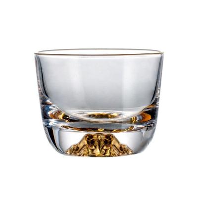 China Wholesale Viable Luxury Blown Mountain Hand Cup Crystal Glass Gold Rim Tea Bottom Cup for sale