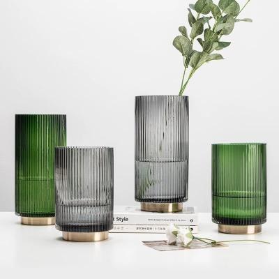 China Minimalist Green Gray Color Antique Vertical Stripe Home Decor 4 Cylinder Glass Vase Set With Copper Base for sale