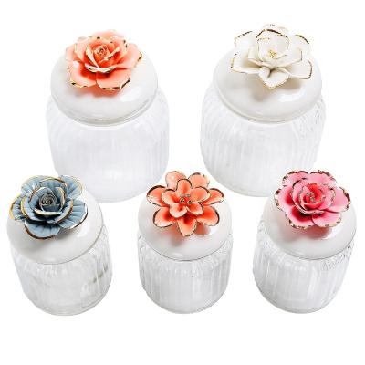 China Wholesale Heatable Luxury Creative Glass Storage Jars With Airtight Ceramic Lids for sale