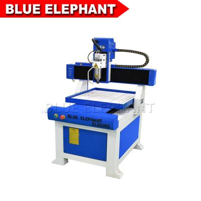 China ELECNC- 6060 Mini Advertising CNC Router with Moving Table for Carving Plywood for sale