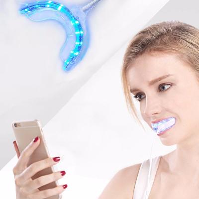 China New Product Silicone LED Tooth Whitener Device Gel Kit 3 Dental Whitening Ports For Teeth Whitening for sale