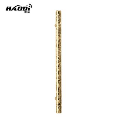 China Modern Luxury Haodi Kitchen Modern Luxury Hammer Grain Design Wardrobe Drawer Pulls Brass Gold Cabinet Handle for sale