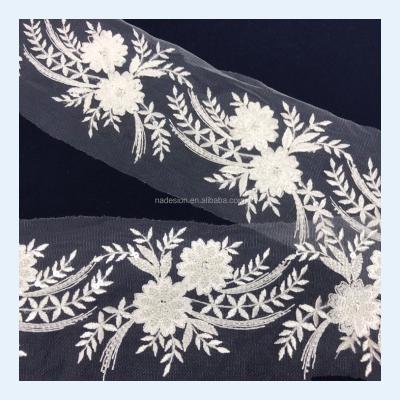 China Viable white lace trim sequin wedding dress lace up trim fabric wholesale white wedding dress white lace trim for sale