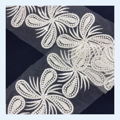 China Viable White Tulle Embroidery Lace Trim With Latest Heavy Beaded Sequin Luxury Wedding Dresses Lace Up Trim Fabric for sale