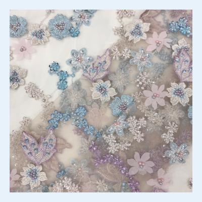 China New viable designs 3d lace / 3d applique blush bridal lace fabric / embroidered floral flowers fabric 3d lace fabric for sale