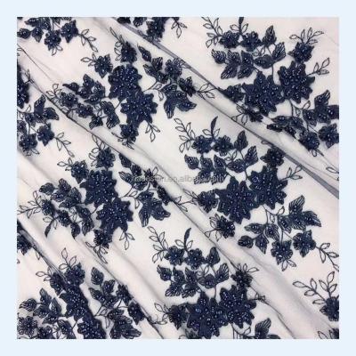 China Gorgeous Handmade Beaded Viable African Fashion Wholesale Sequin Lace Fabric Navy Ceremony Fabric for sale