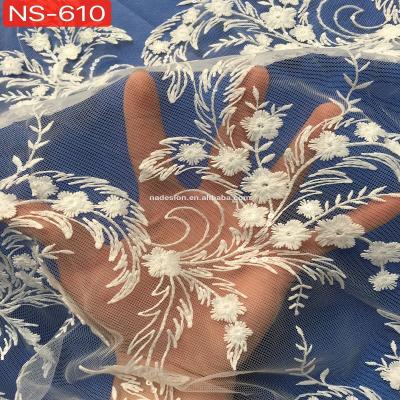 China Sustainable Popular Natural Standard White Bridal Dress Embroidery Lace Fabric Europe Wedding for sale