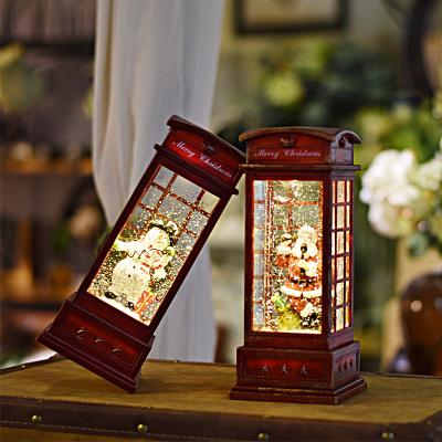 China Retro World Phone Booth Plastic Wind Lamp European Style LED Rotating Candlestick Lantern Festival Gift Crafts Small Night La for sale