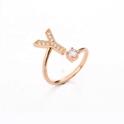 China FASHIONABLE Running 26 Alphabets Gold Color and Initial Letter Zircon Silver Gold Birthstone Color Rings For Women for sale