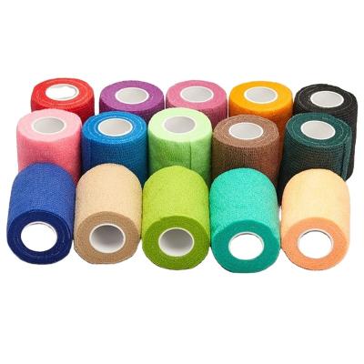 China Cohesive Colorful Tattoo Gun Grip Bandages Nonwoven Waterproof Self Adhesive Finger Wrist Pad Tattoo Props for sale