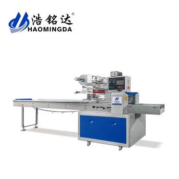 China Automatic Frozen Commodities Dumplings Packing Machine Squishy Rice Chicken Wrapping Packing Machine for sale