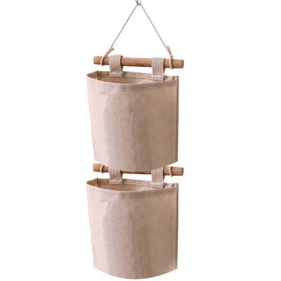 China Door Mounted Canvas Storage Bag Wall Hanging Cotton Cloth Storage Bag 2 Pockets Organizer for Room Bathroom Washing Toiletries for sale