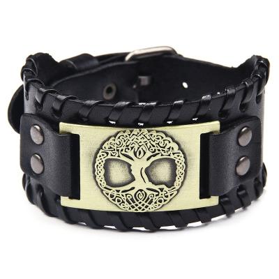 China Custom Embossed Vintage Metal Tree of Life Charm Leather Cuff Bracelet For Women Men for sale