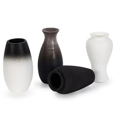 China Nordic Minimalist Contracted Black And White GuYao Frosted Handmade Ceramic Vase Decorative Vase for sale