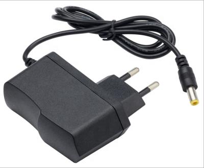 China Plastic EU UK TO US AU 5V 2A Power Adapter AC 100-240VAC Power Adapter With Difference Plug Type for sale