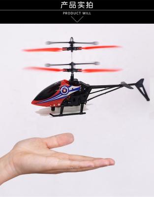 China New Christmas Gift LED Infrared Inductive RC Helicopter Colorful Built-in Helicopter 18*3.5*5.0CM Flying Ball Hand Held Lights for sale