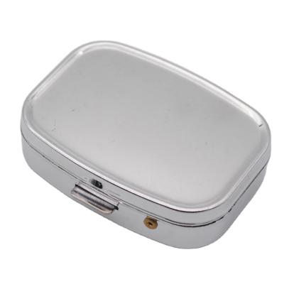 China Rectangle Stainless Compact Metal Mini Iron Pill Box Empty Pill Box With Cutter for sale