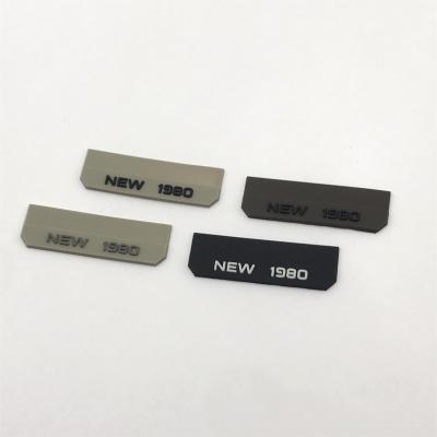 China Washable High Quality Custom Garment Patches For Clothing 3d Soft Pvc Rubber Labels Rubber Plastic Label for sale