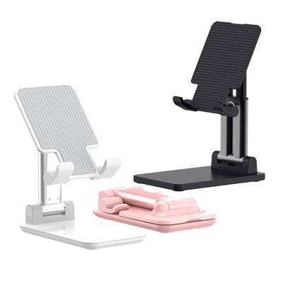 China New Desktop Tablet Phone Stand Mini Folding Mobile Phone Adjustable Tending Portable Adjustable Stand for sale