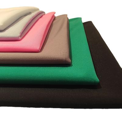 China Newest Design Fabric 87% Nylon 13% Spandex 4 Way Stretch Matte Weft Knitting Fabric QUICK DRY Knitting Fabric for sale