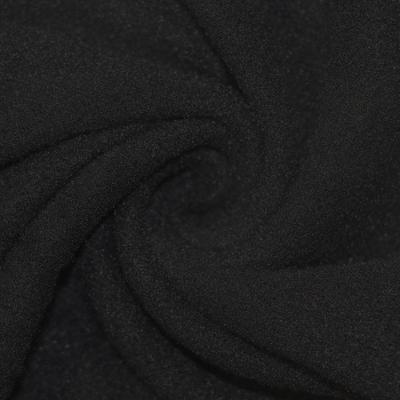 China Other In Stock 100 Polyester Brushed Weft Black Fabric For Sports Suit for sale