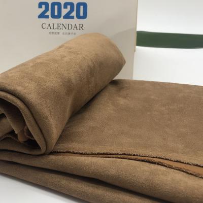 China Other Direct China Textiles Synthetic Leather Stretch Polyester 100% Suede Bonded Faux Fabric For Garment for sale