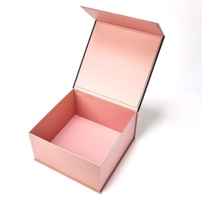 China Recyclable Custom Luxury Pink Foldable Magnet Flap Clothing Paper Box Closure Magnetic Gift Boxes With Black Ribbon for sale