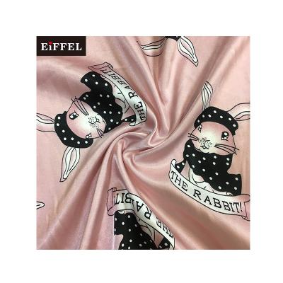 China Custom Shiny Pink Anti Pill Cartoon Rabbit Pattern Printed Polyester Spandex Taffeta Satin Fabric for sale