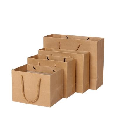 China Recyclable Recycled Brown Shopping Bag For Shoes And Clothes Packaging Kraft Paper Bag With Rope Handle for sale