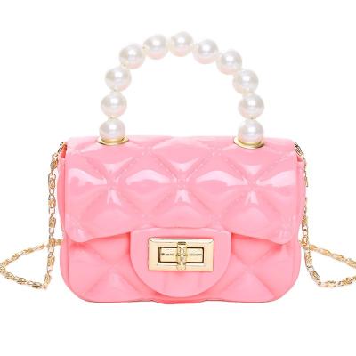 China 2022 New Design PU Solid Color Pearl Jelly Bag Cute Chain Purse Fashion Waterproof Portable Handbag For Kids for sale