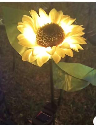 中国 LED Sunflower Solar light, with a glowing top, an integrated solar panel and battery，15*70CM 0.6W 600mAh12~16 hours 販売のため