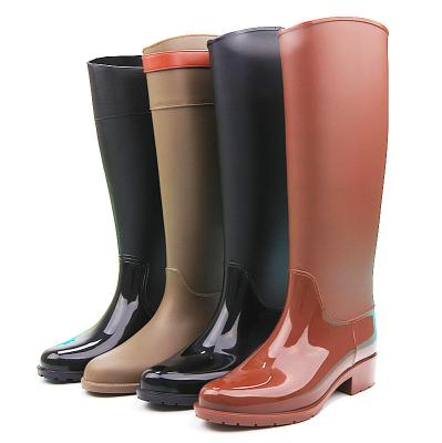 China Fashion Trend Manufacturer Ladies Knee Boots Rubber Boots Outdoor Waterproof PVC Rain Wellington Riding Plastic Bell Boots High For Women for sale