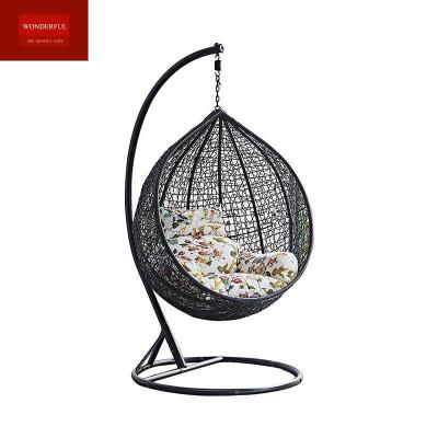 China Create a Relaxing Oasis with a Stylish Rattan Hanging Chair and Waterproof Cushion for sale