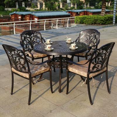 China Outdoor dining set handig ontwerp met postverpakking gegoten aluminium tafel en stoel Te koop