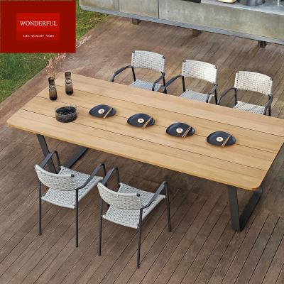 China Modern Outdoor Wooden 8 Seater Dining Table Set with Quick Dry Foam Cushions and More for sale