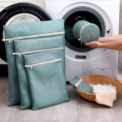 China 2021 Amazon multi-shape storage bag thickened three-layer sandwich laundry casual hot-selling bag for sale